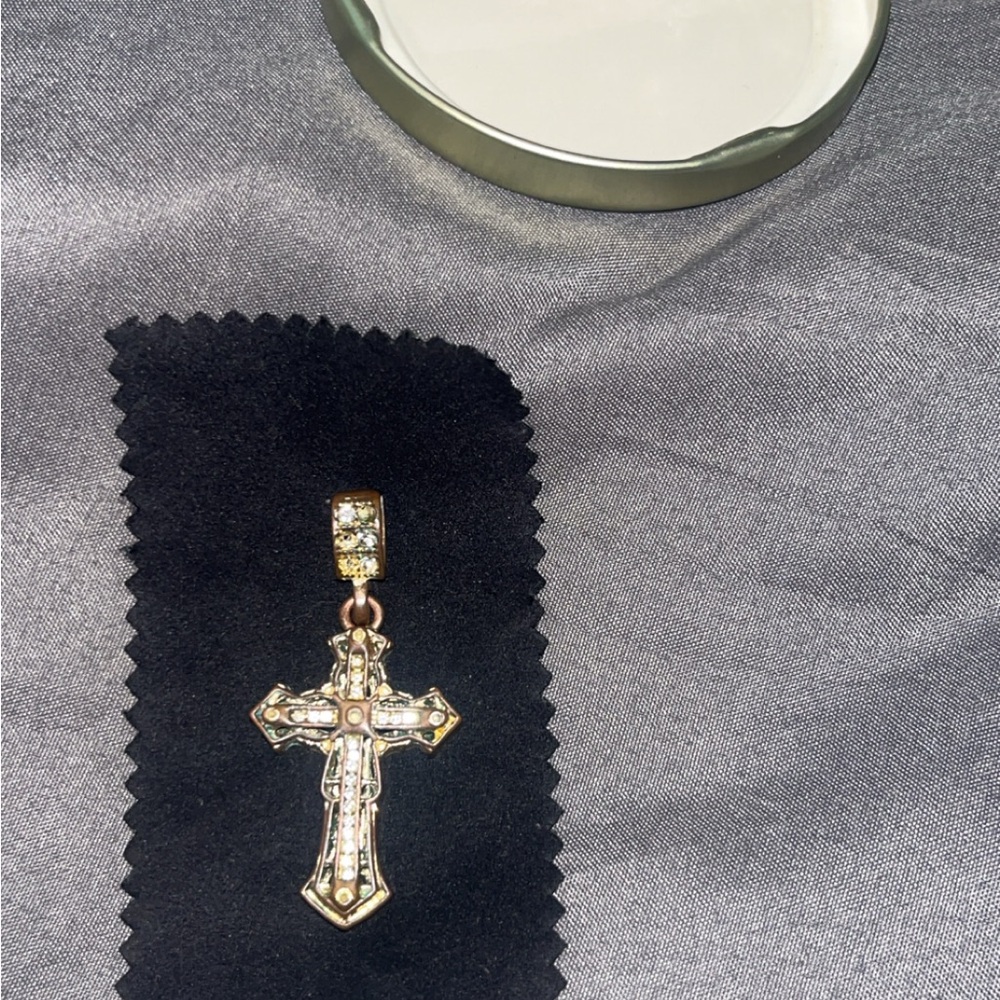 Elegant Gold and Silver Cross Pendant